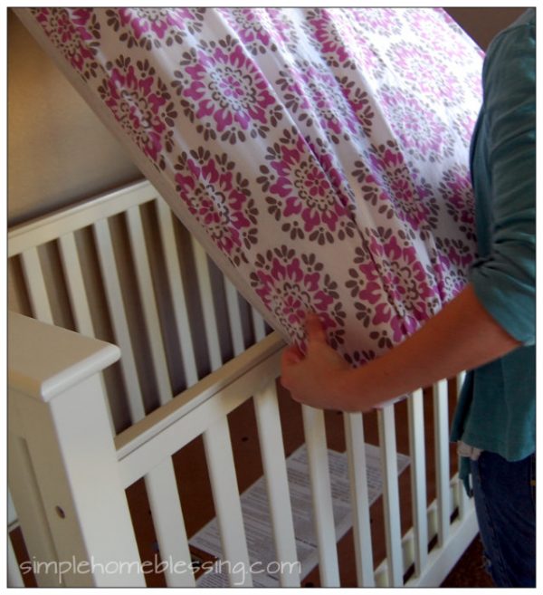 Quick and easy way to change a crib sheet *tutorial*