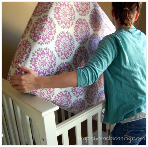 Quick and easy way to change a crib sheet *tutorial*