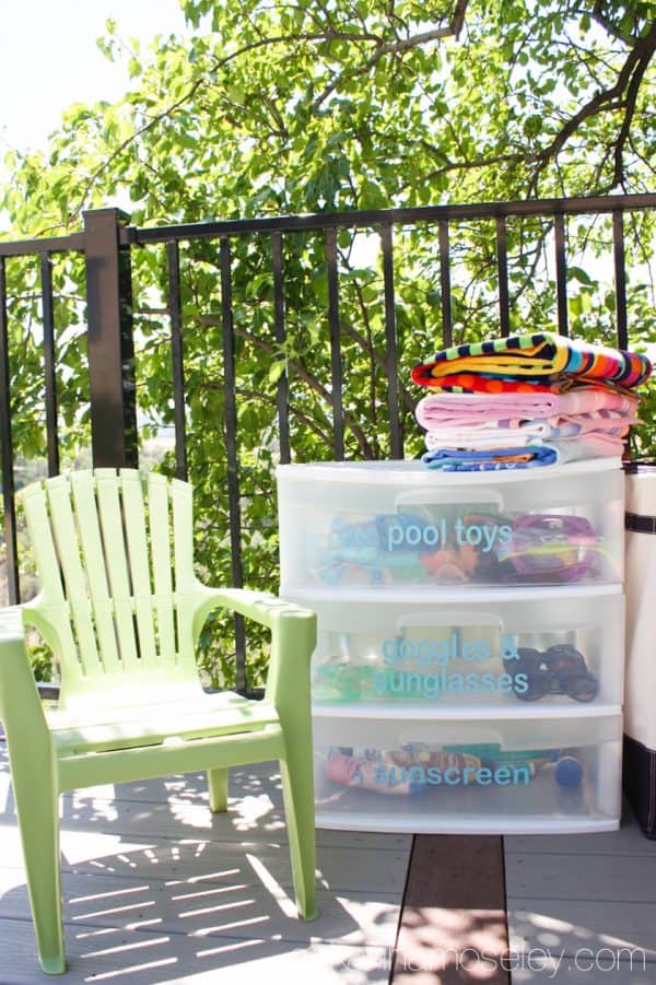 A simple and affordable way to organize outdoor pool toys and towels - Ask Anna