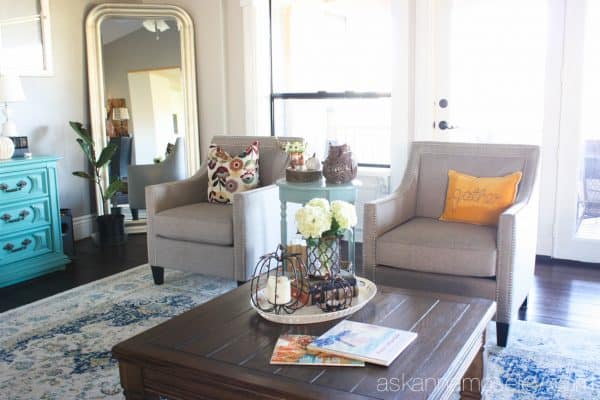 By adding a larger rug, a little more seating and the proper size coffee table, I was able to take my living room from boring to fabulous! - Ask Anna