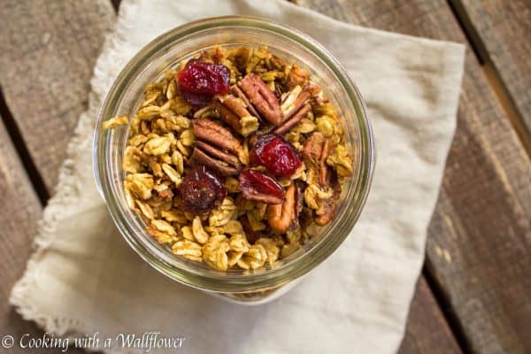 Granola filled with pumpkin puree, toasted pecans, sweet cranberries, and maple syrup. This maple pumpkin pecan granola is the most amazing breakfast and snack for fall. 