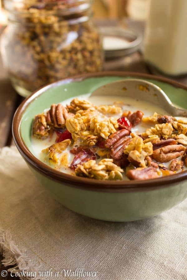 Granola filled with pumpkin puree, toasted pecans, sweet cranberries, and maple syrup. This maple pumpkin pecan granola is the most amazing breakfast and snack for fall. 