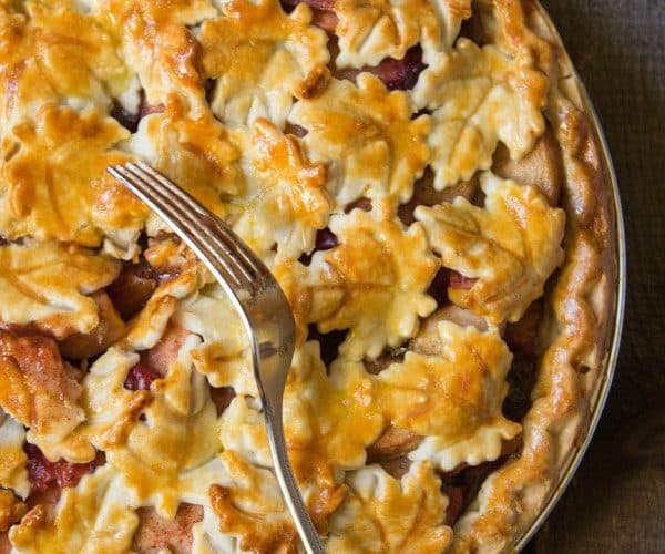 Slightly sweetened apple and cranberry pie with the warm flavors of cinnamon, nutmeg, and brown sugar. This cranberry apple pie is the perfect dessert to transition from fall to winter.