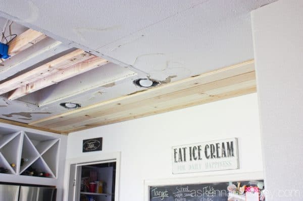 Natural wood ceiling in a kitchen - see the transformation from an outdated light box, to pendants and a beautiful pine wood ceiling | Ask Anna