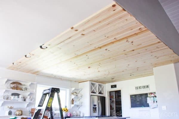 Natural wood ceiling in a kitchen - see the transformation from an outdated light box, to pendants and a beautiful pine wood ceiling | Ask Anna