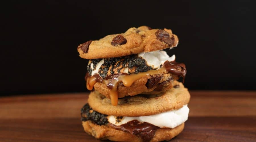 Layers of chocolate chip cookies, rich dark chocolate sea salt caramels & toasted marshmallows will have you going back for more of these gourmet s'mores | Ask Anna