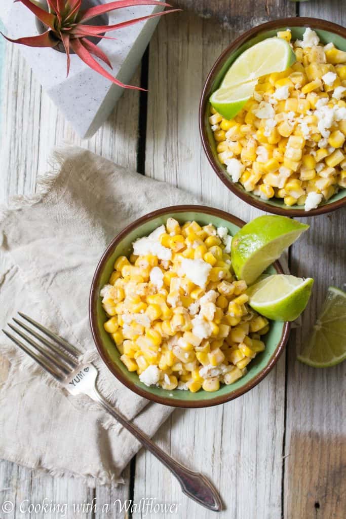 Corn kernels mixed with mayonnaise, melted butter, and queso fresco cheese then seasoned with chili powder and lime juice. This easy to make Mexican Street Corn is delicious and perfect as a side. | Cooking With a Wallflower