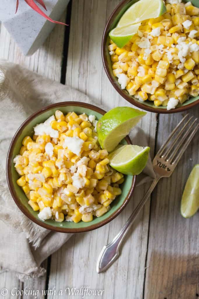 Corn kernels mixed with mayonnaise, melted butter, and queso fresco cheese then seasoned with chili powder and lime juice. This easy to make Mexican Street Corn is delicious and perfect as a side. | Cooking With a Wallflower