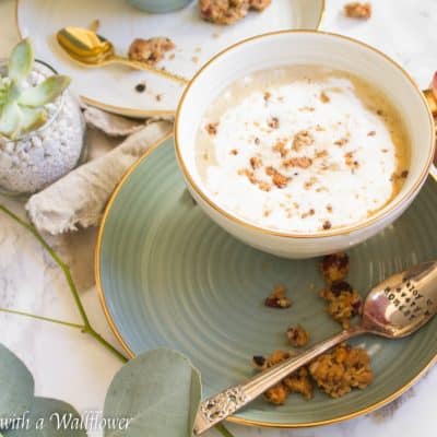 Strong brewed coffee latte served with pumpkin puree, maple syrup, and oats. This maple pumpkin almond oatmeal latte is delicious and perfect for fall. | Cooking With a Wallflower