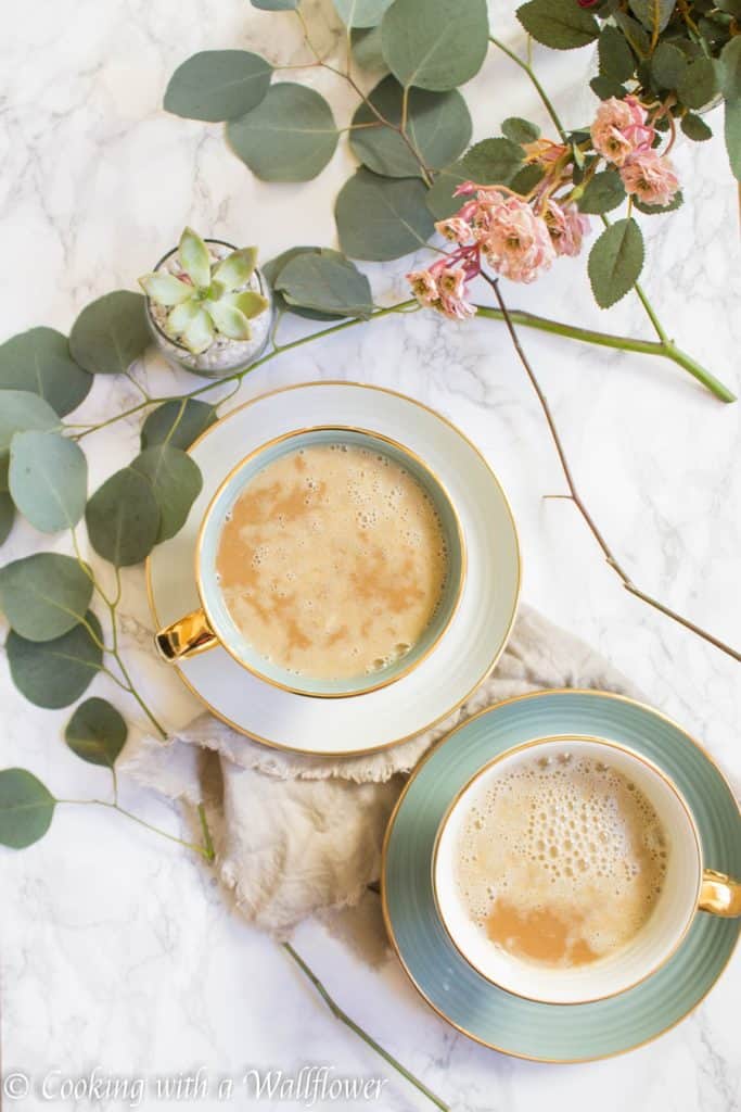 Strong brewed coffee latte served with pumpkin puree, maple syrup, and oats. This maple pumpkin almond oatmeal latte is delicious and perfect for fall. | Cooking With a Wallflower