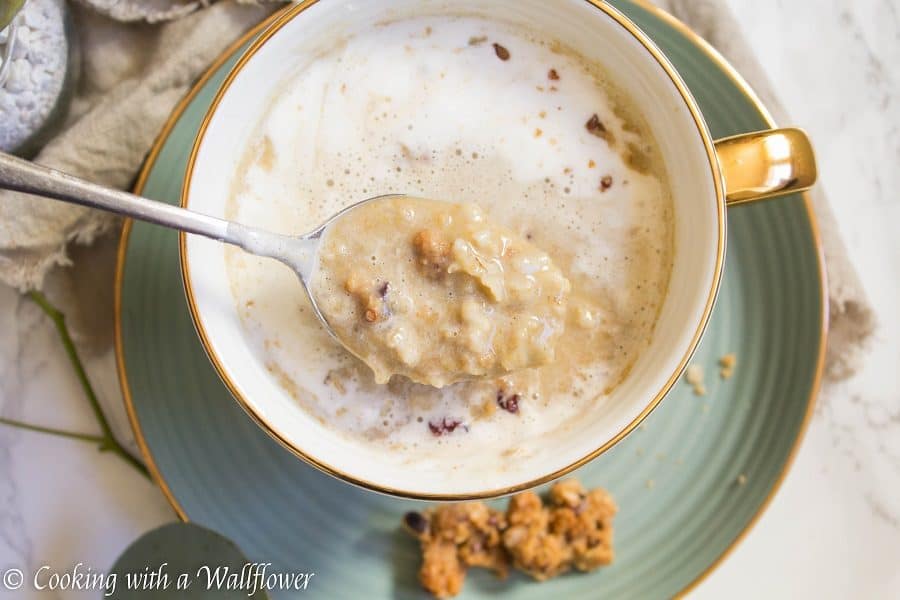 Strong brewed coffee latte served with pumpkin puree, maple syrup, and oats. This maple pumpkin almond oatmeal latte is delicious and perfect for fall. | Cooking With a Wallflower