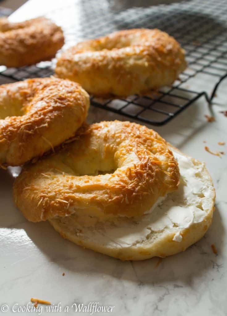 Homemade bagels topped with freshly grated Parmesan cheese, these homemade Parmesan bagels are delicious and easy to make. | Cooking with a Wallflower