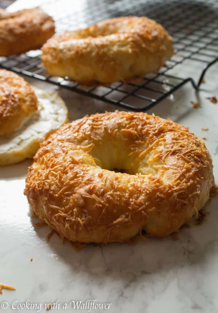 Homemade bagels topped with freshly grated Parmesan cheese, these homemade Parmesan bagels are delicious and easy to make. | Cooking with a Wallflower