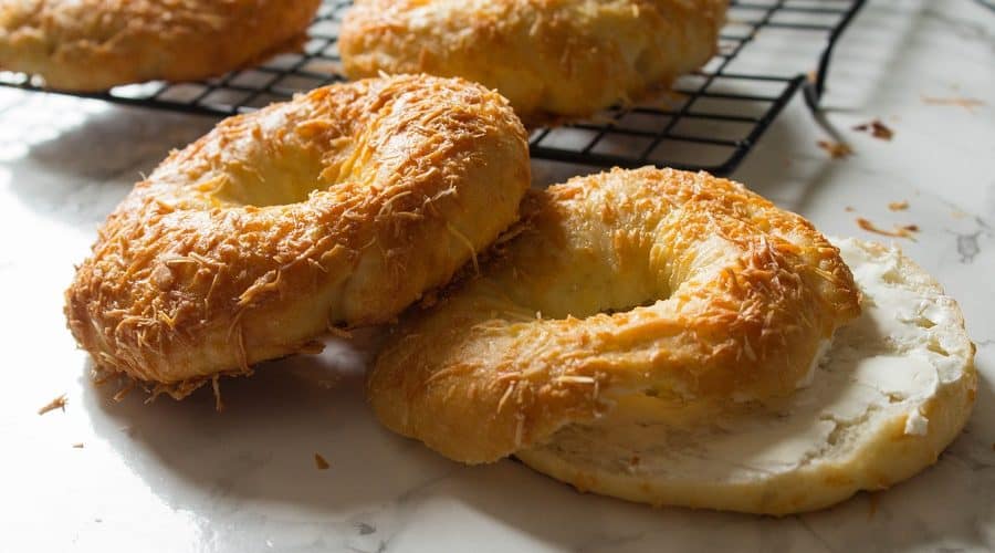 Homemade bagels topped with freshly grated Parmesan cheese, these homemade Parmesan bagels are delicious and easy to make. | Cooking with a Wallflower