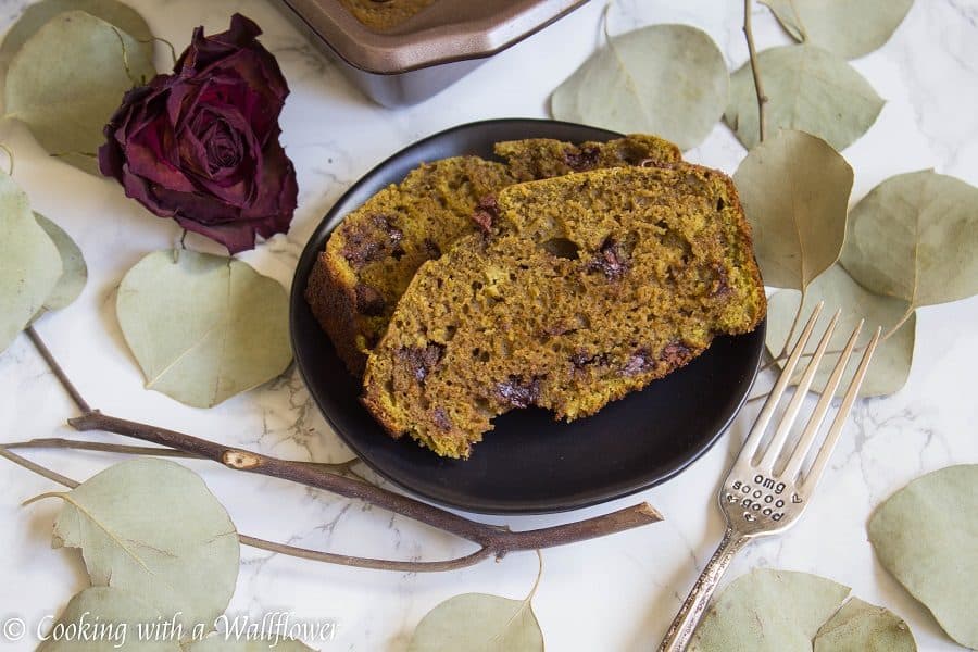 Divine bread filled with chocolate chips and a hint of matcha green tea. This matcha green tea chocolate chip bread is delicious and perfect for breakfast or an afternoon snack. | Cooking with a Wallflower