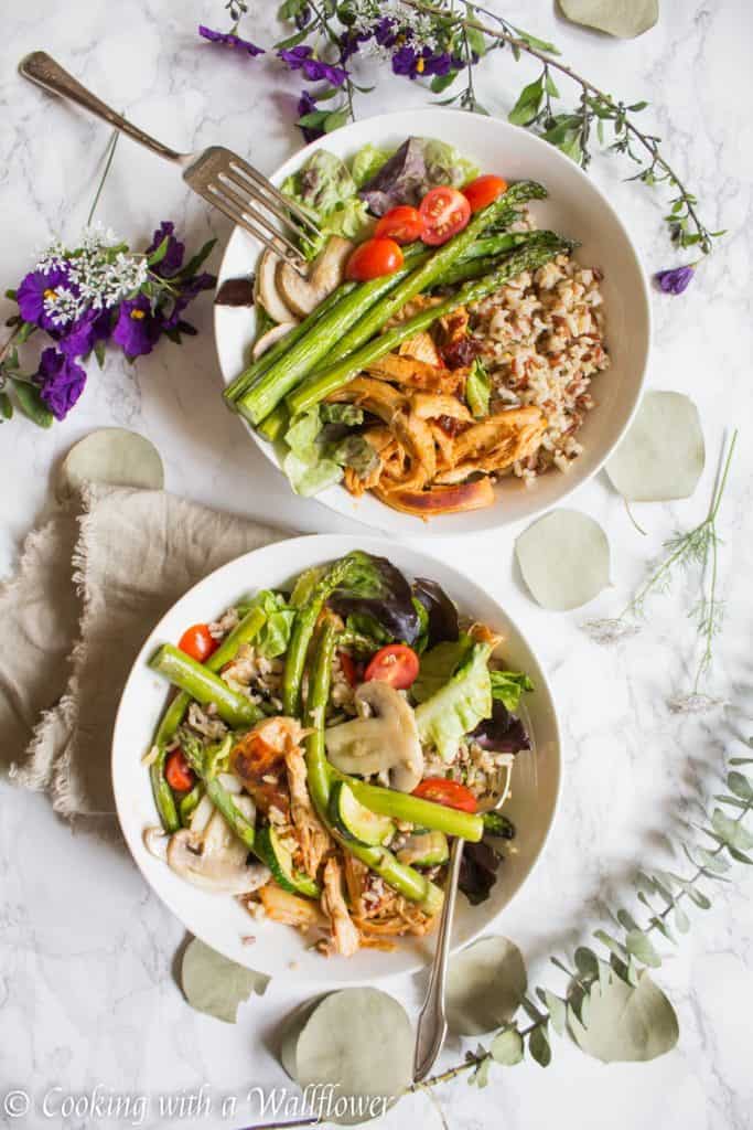 This honey chipotle chicken grain bowl is delicious and healthy! Mixed grains topped with honey chipotle chicken, roasted veggies, mixed greens, then drizzled with honey balsamic vinaigrette, it's the perfect quick and easy dinner! | Cooking with a Wallflower