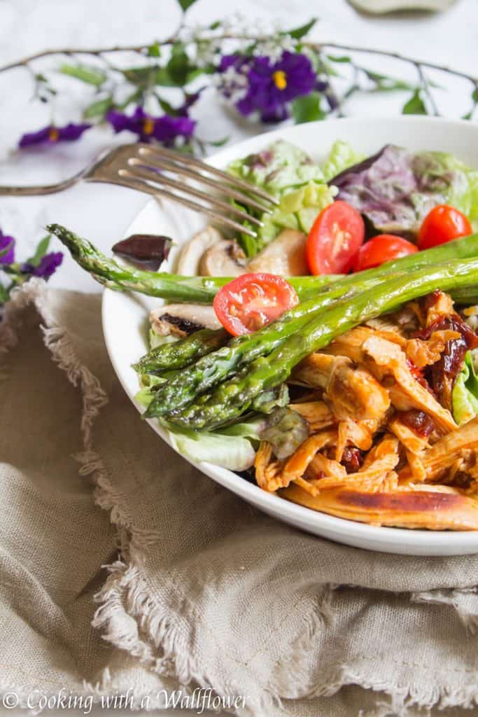 This honey chipotle chicken grain bowl is delicious and healthy! Mixed grains topped with honey chipotle chicken, roasted veggies, mixed greens, then drizzled with honey balsamic vinaigrette, it's the perfect quick and easy dinner! | Cooking with a Wallflower