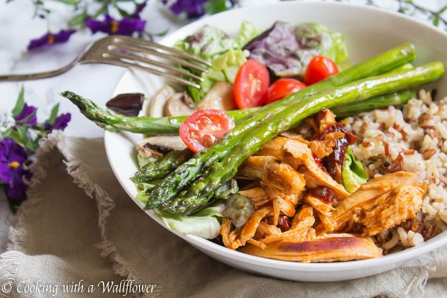 This honey chipotle chicken grain bowl is delicious and healthy! Mixed grains topped with honey chipotle chicken, roasted veggies, mixed greens, then drizzled with honey balsamic vinaigrette, it's the perfect quick and easy dinner! | Cooking with a Wallflower