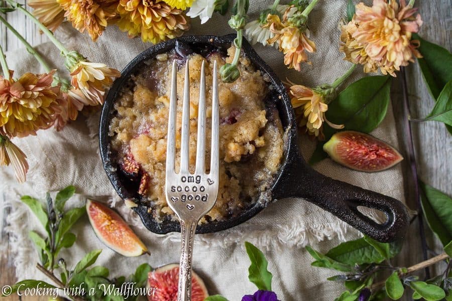 Caramelized figs topped with a buttery, crumble topping. This maple fig crumble is the perfect individually sized dessert for an early autumn dessert. | Cooking with a Wallflower