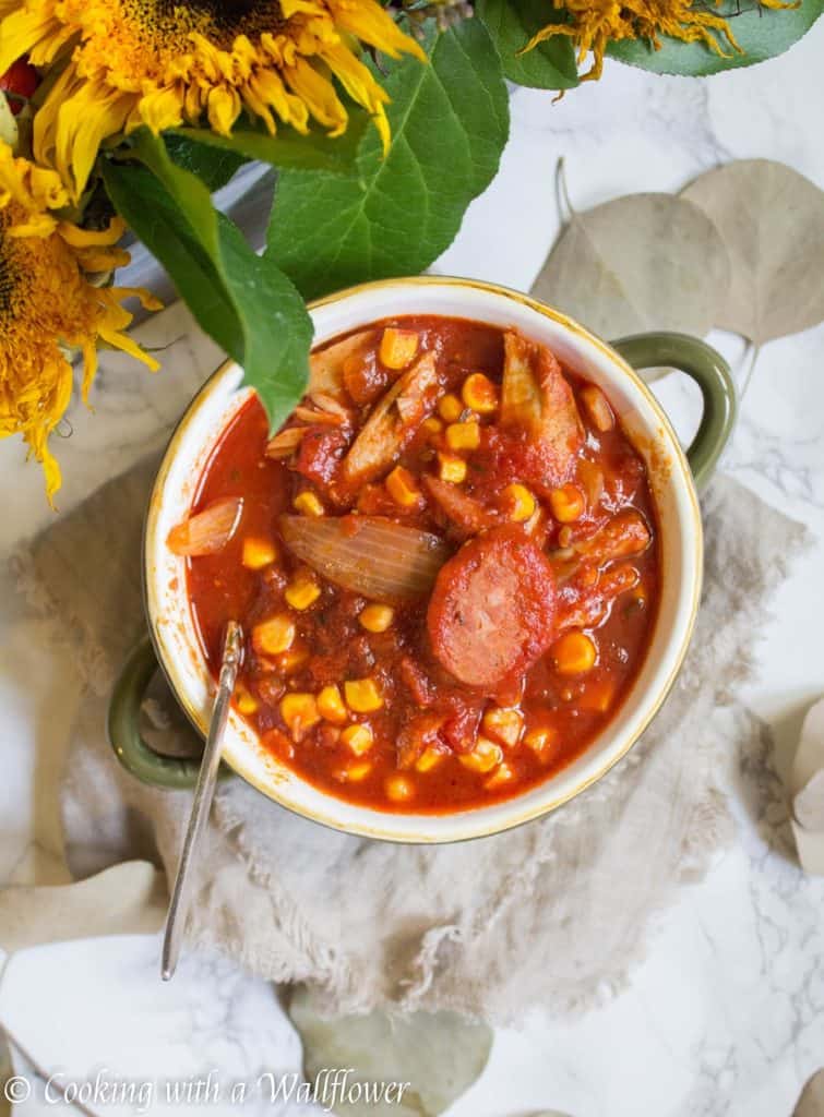 Warm, comforting chili filled with chicken, sausage, and veggies. This smoky chicken and sausage chili is delicious, healthy and perfect for the winter. | Cooking with a Wallflower