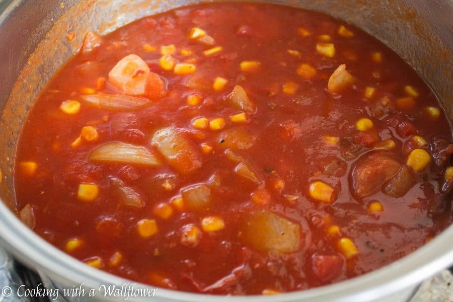 Warm, comforting chili filled with chicken, sausage, and veggies. This smoky chicken and sausage chili is delicious, healthy and perfect for the winter. | Cooking with a Wallflower