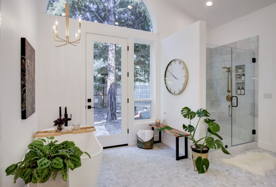 Master bathroom remodel from outdated 90's to bright and modern using Carrera marble. 