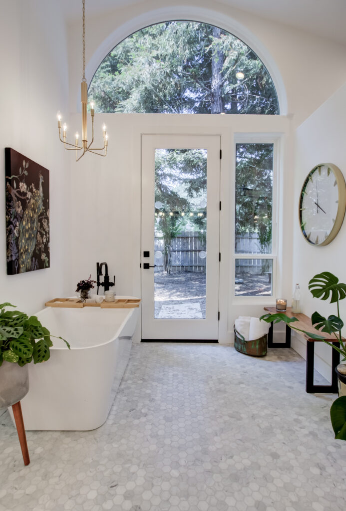 Master bathroom remodel from outdated 90's to bright and modern using Carrera marble. 