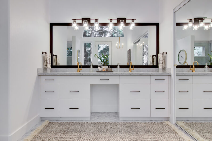 Master bathroom remodel from outdated 90's to bright and modern using Carrera marble. 