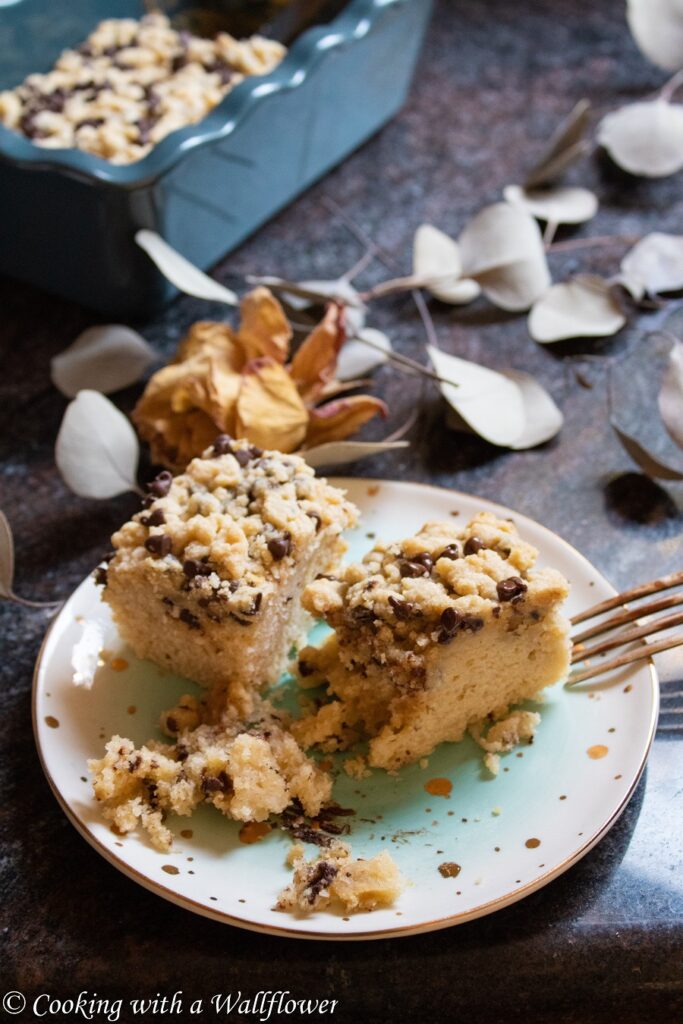 Coffee cake filled with mini chocolate chips, topped with a buttery crumble. This chocolate chip coffee cake is a delicious way to start the day. | Ask Anna