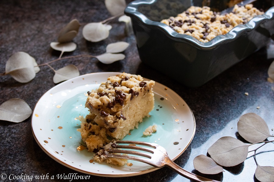 Coffee cake filled with mini chocolate chips, topped with a buttery crumble. This chocolate chip coffee cake is a delicious way to start the day. | Ask Anna