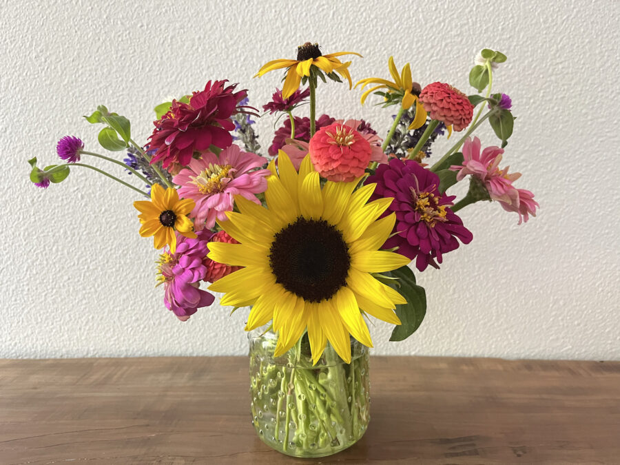 Bouquet of zinnias and sunflowers at Little Wagon Farmstead.