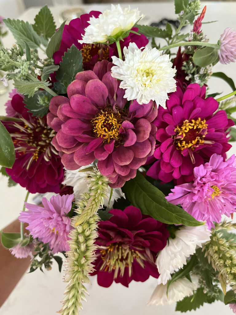 Bouquet of zinnias and cosmos from Little Wagon Farmstead.