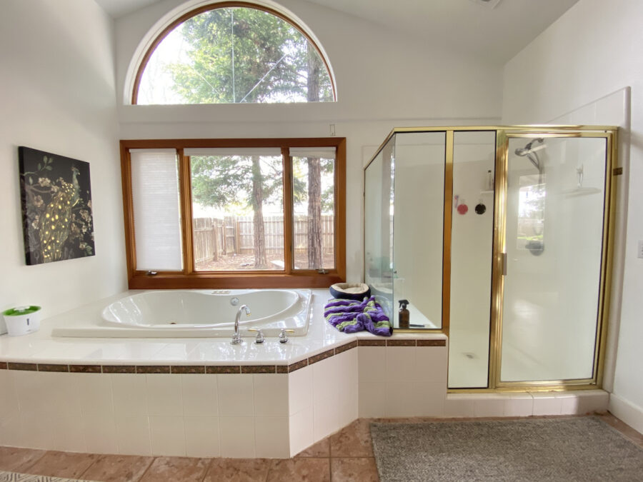 Master bathroom remodel from outdated 90's to bright and modern using Carrera marble. 